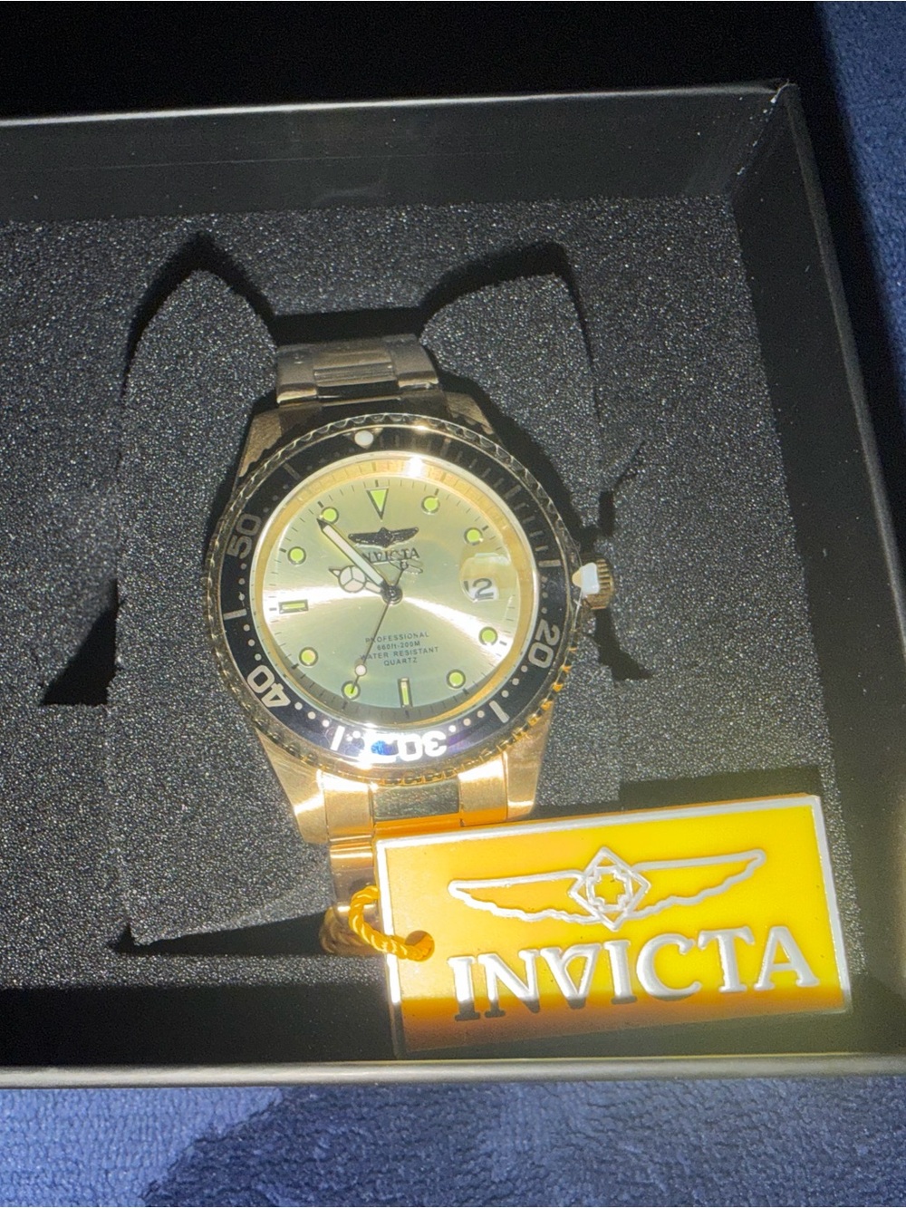 Invicta Men's Gold Tone Watch with Black Bezel and Yellow Tag